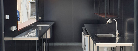 interior of a servery kitchen made from a shipping container