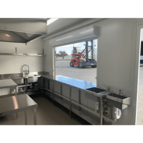 20' High Cube Modified Kitchen Container interior showing off the kitchen sinks and work bench