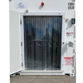 A close up of a pallet wide door open installed on shopping container